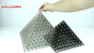 Satisfying magnetic games, building two pyramids from magnetic sticks and balls.