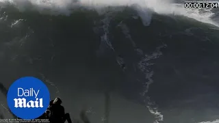 Surfer gets wiped out by a gnarly 60 FOOT WAVE!