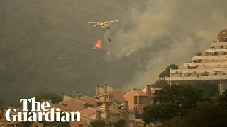 Wildfire in south of Spain forces thousands to flee their homes