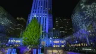 Rockefeller Center Christmas tree lights turned on