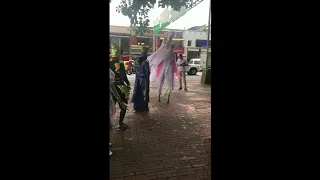 Woman Dancing on Stilts