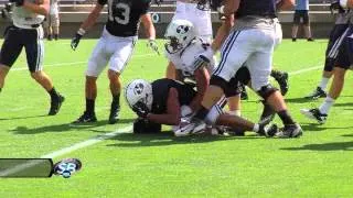 BYU RB Algie Brown runs over defense in final fall scrimmage