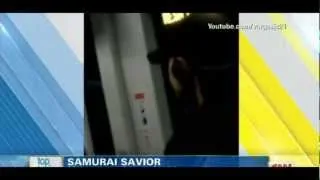 Samurai Savior - Man gets out samurai sword to protect a man on a subway! Must Watch!