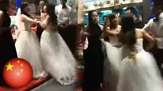 Bride battles with her soon-to-be husband's pregnant ex-girlfriend