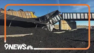 Train derails onto interstate north of Pueblo, Colorado