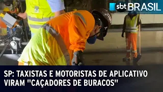 Taxistas e motoristas de aplicativo viram "caçadores de buracos" em São Paulo | SBT Brasil (09/09/23