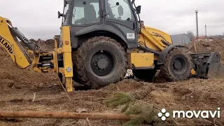 Работа на погрузчике bull 220 и new Holland b80.