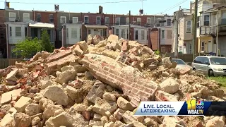 Baltimore church calls on city to clear lot of dumping debris