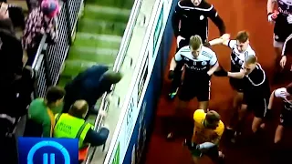 Supporter jumping in in the scuffle between Corofin v Kilcoo AIB GAA Football All Ireland club final