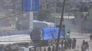 More trucks carrying aid supplies enter Gaza through the Rafah Border crossing