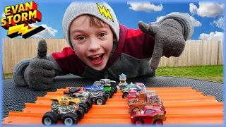 Monster Trucks VS Toy Cars In a Big Tub Of Corn