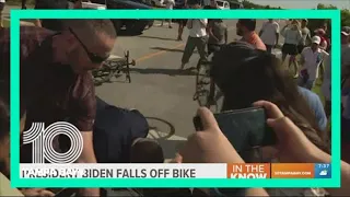 Biden takes tumble while getting off bike after a beach ride