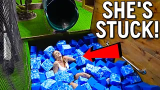 The CRAZIEST Mini Golf Course Ever! - Epic Slide, MASSIVE Loop, and More!