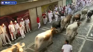 Pamplona runner brutally trampled by charging bulls during annual festival ? #pamplona #bullrace