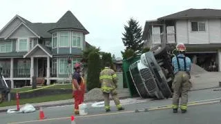 DUMP TRUCK ROLLOVER ON MARMONT ST IN COQUITLAM AUG 5 2011 COPYRIGHT BCNEWSVIDEO.m4v