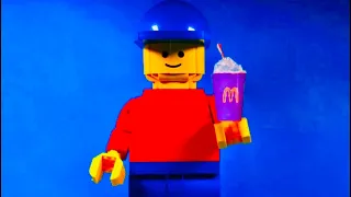 Giant Lego Man tries the Grimace Shake