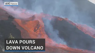 Lava pours down slopes of La Palma volcano after partial cone collapse