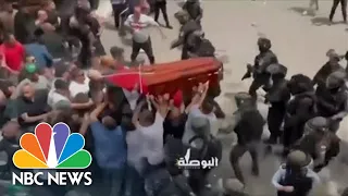 Violence Erupts At Funeral For Palestinian Journalist Killed Covering Israeli Military Raid