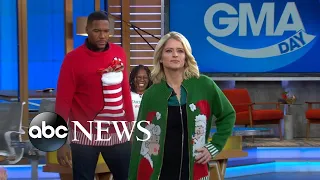 Michael Strahan and Sara Haines model Whoopi Goldberg's Christmas sweaters