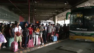Travellers at the Parañaque Integrated Terminal Exchange (PITX) leave for the holidays
