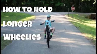 How to wheelie a mountain bike for a long time