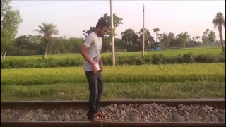 A stupid boy almost killed himself by a fast train.