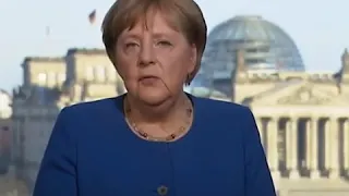 Merkelswort zur Zeit des Coronaviruses mit arabischen Untertitel