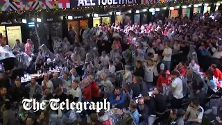 England fans boo and throw drinks in frustration over the World Cup 0-0 score against USA