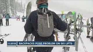 Backpacks pose problem on ski lifts