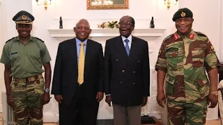 Mugabe refuses to stand down in talks with military
