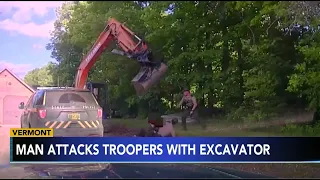 Vermont man swings excavator bucket at troopers to stop son's arrest: Police