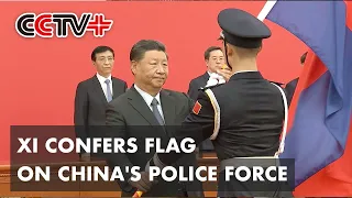 Xi Confers Flag on China's Police Force