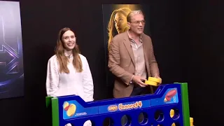 Elizabeth Olsen and Paul Bettany play Connect 4