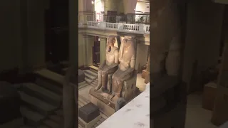 The biggest statue inside The Egyptian Museum - king Amenhotep the third and Queen Tye - Cairo