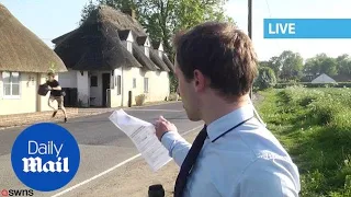 Youth seen carrying suspicious plant during live news report - Daily Mail