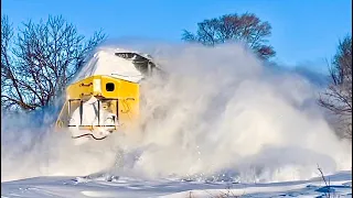 IOWA INTERSTATE TRAIN SMASHES THROUGH THE SNOW AT HIGH SPEED! MUST SEE!
