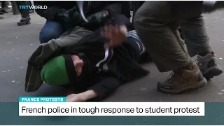 French police clash with students demonstrating in Paris over proposed overhaul of labour code