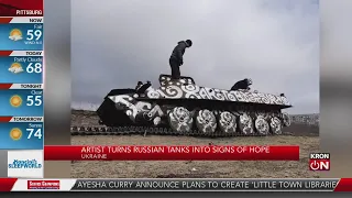 Artist turns Russian tanks into sign of hope