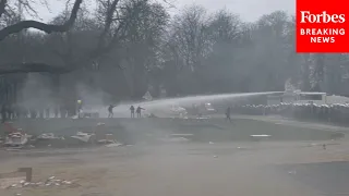 Brussels Protesters Against COVID-19 Restrictions Hit With Police Water Canon