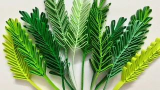 Quilling sprigs of leaves with hair brush