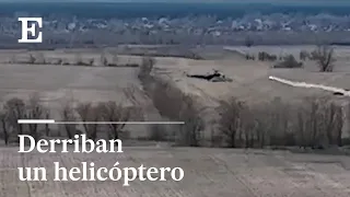 La fuerzas UCRANIAS derriban un HELICÓPTERO RUSO en las afueras de Kozarovychi | EL PAÍS