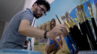 Michele Del Campo painting for his solo show in his artist studio in Madrid