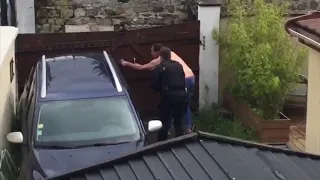 French gendarme intervening with woman with rifle