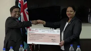 Fijian Minister for Industry officiates at the cheque handover by Indian High Commissioner to Fiji