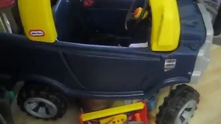 Working on his Little Tikes Truck