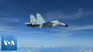 US, Chinese Jets in Close Encounter Over South China Sea | VOA News