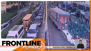 Sandamakmak na beer tumilapon sa kalsada mula sa naaksidenteng truck sa Cainta | Frontline Pilipinas