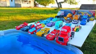 Disney cars toys slide to the blue water | lightning mcqueen toys