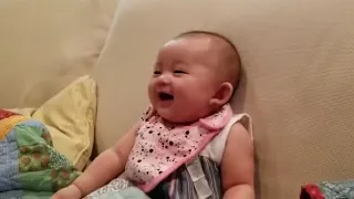 4 month old baby gia laughing hysterically