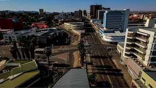 AERIAL VIEW OF J MEINERT ST & INDEPENDENCE AV IN WINDHOEK NAMIBIA | ПОЛЕТ НАД ЦЕНТРОМ ГОРОДА ВИНДХУК